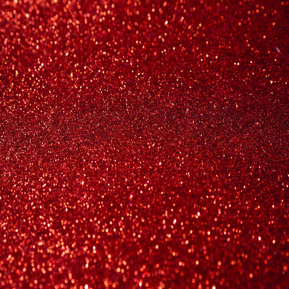 نمای بالا پس زمینه قرمز زرق و برق(top view red glitter background)